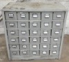 Cabinet with Assorted Fixings.