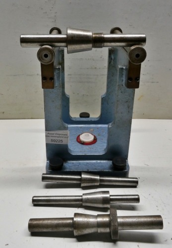Wheel Balancer and Mandrels.