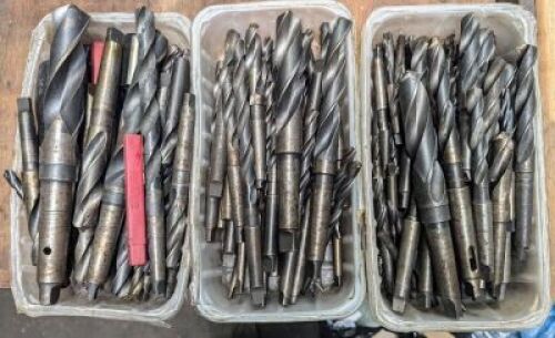 Assortment of taper shank drills up to 1.5" diameter.