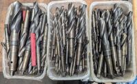 Assortment of taper shank drills up to 1.5" diameter.