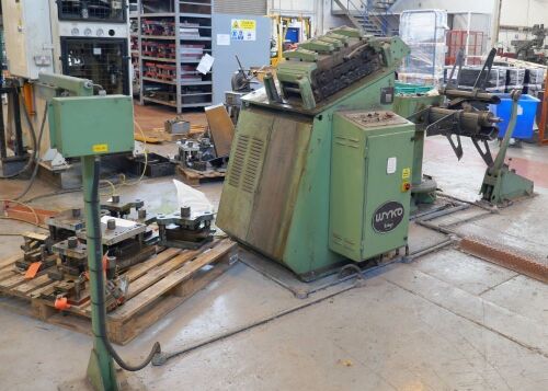 Wyko Press Feed System